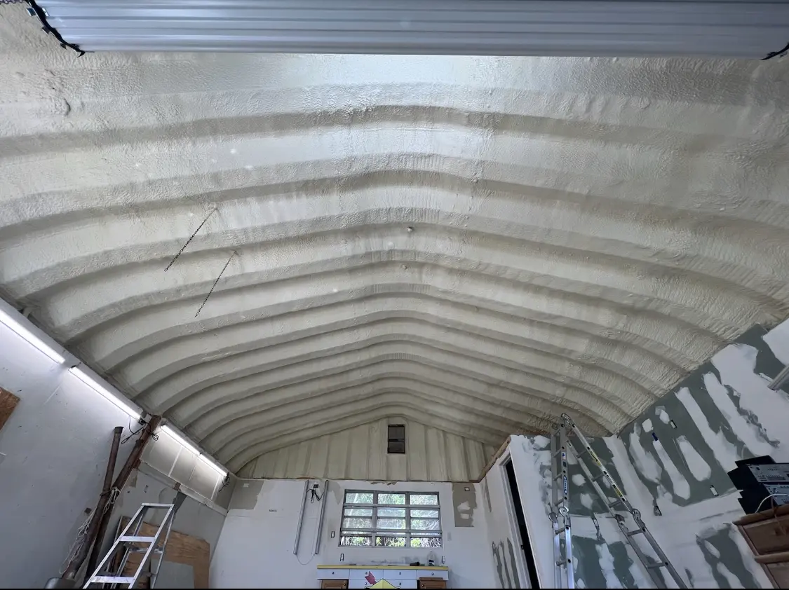 Spray polyurethane foam applied to the underside of a metal roof deck in Gainesville